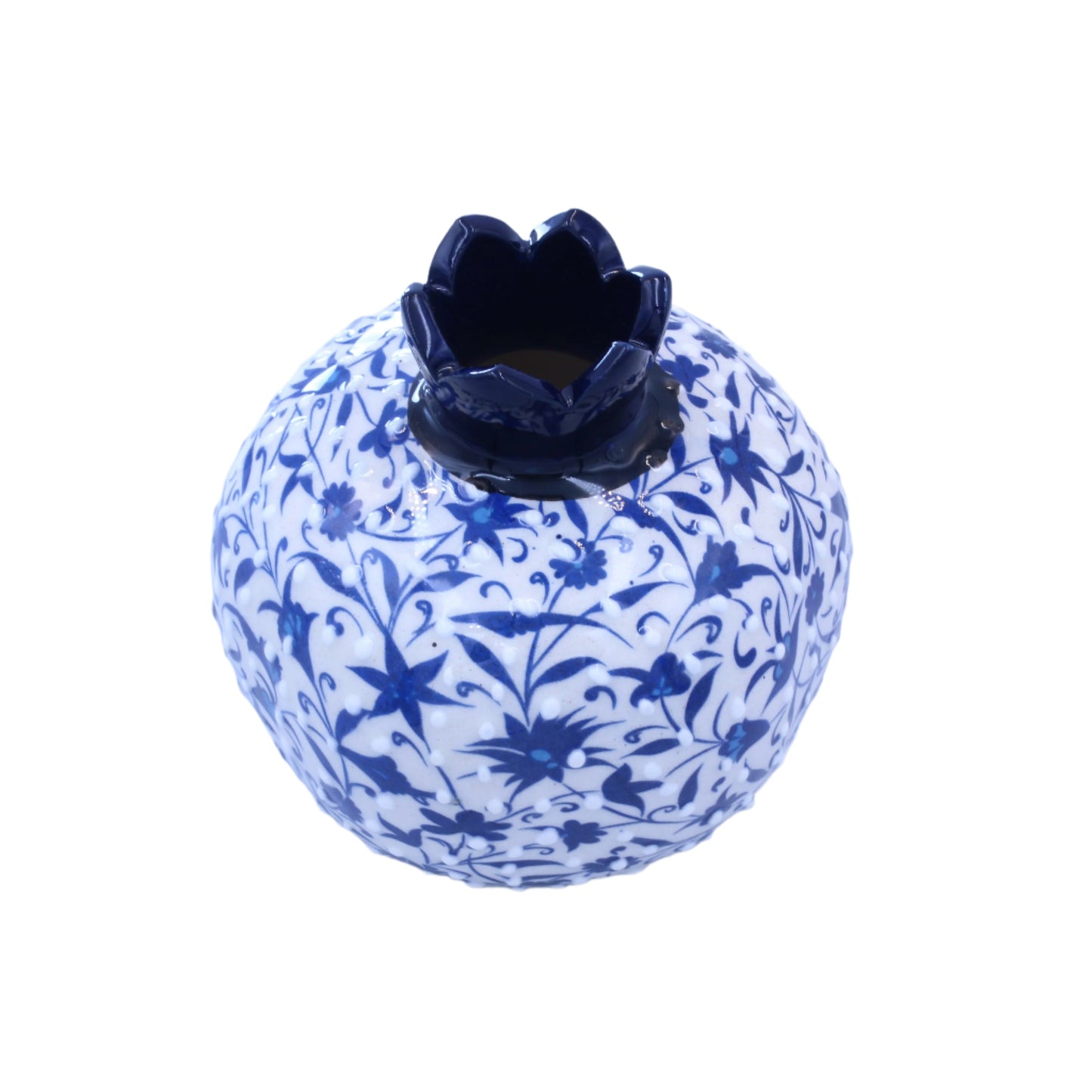 Decorative blue and white patterned vase with a black flower on a light blue background